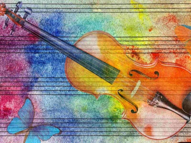 Rysunek skrzypieć i pięciolinia na tle kolorowego tła.